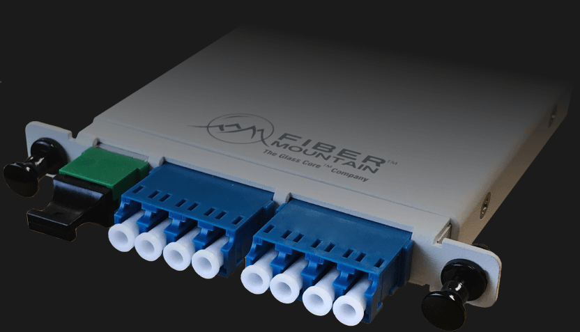 j-series-casettes (1) A side look of a single unit of a white J-Series cassette in a 3-D angle with 1 MPO port to the left and 4 Duplex LC ports to the right
